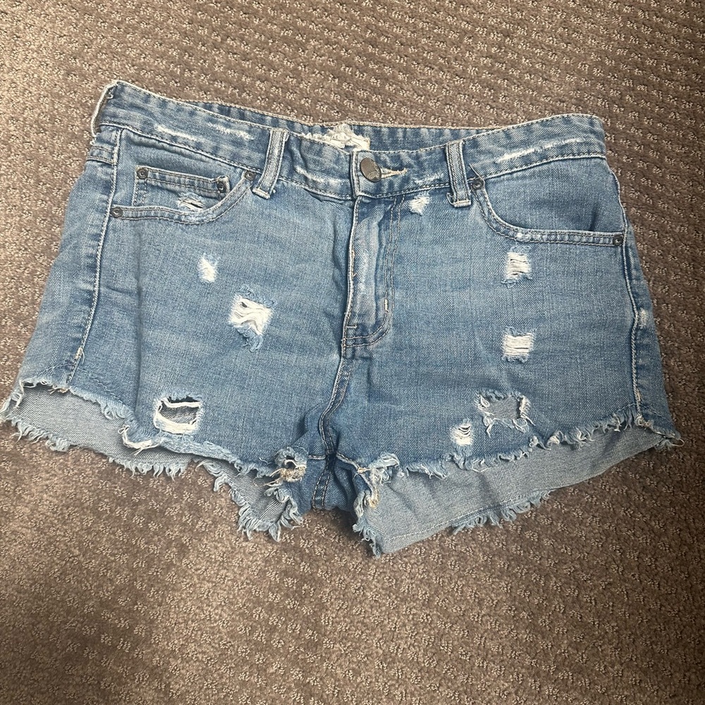 Free people denim shorts. Distressed. Size 27